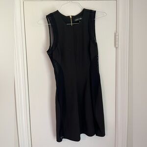 Black dress with mesh panels